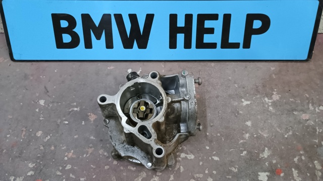 Насос вакуумний 06K145100BB VAG