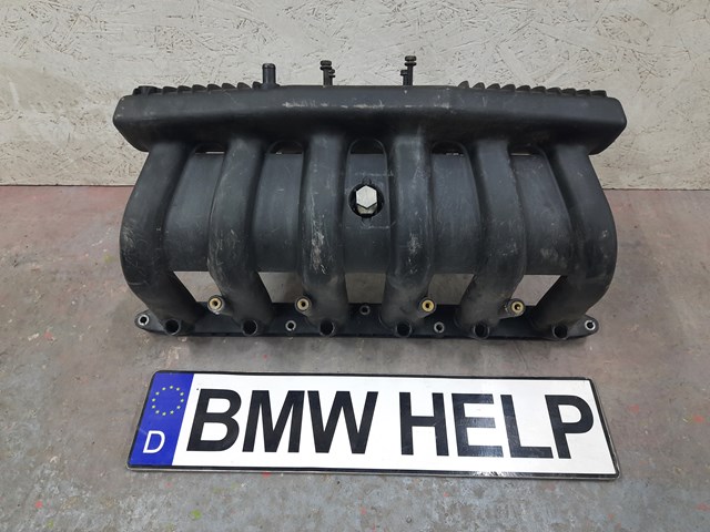 Колектор впускний 11611707034 BMW