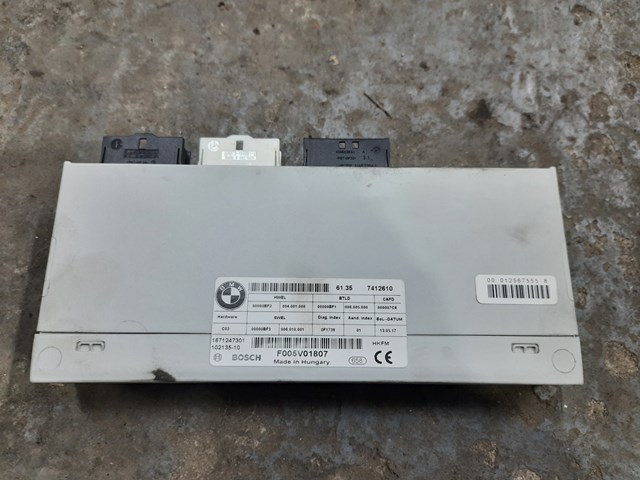 ЕБУ відкриття кришки багажника / двері 3-й (5-й) 61357412610 BMW