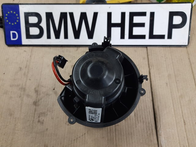 Вентилятор грубки 64119297751 BMW