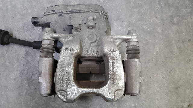 Супорт гальмівний задній правий 68263295AA CHRYSLER