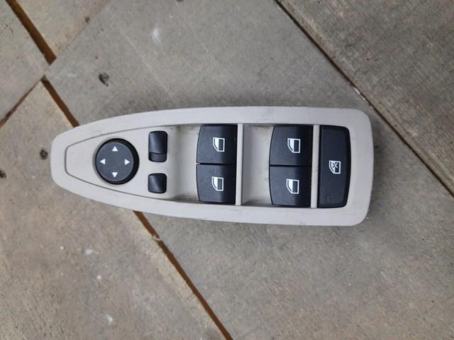 Кнопковий блок керування склопідіймачами передній лівий 9208111 BMW