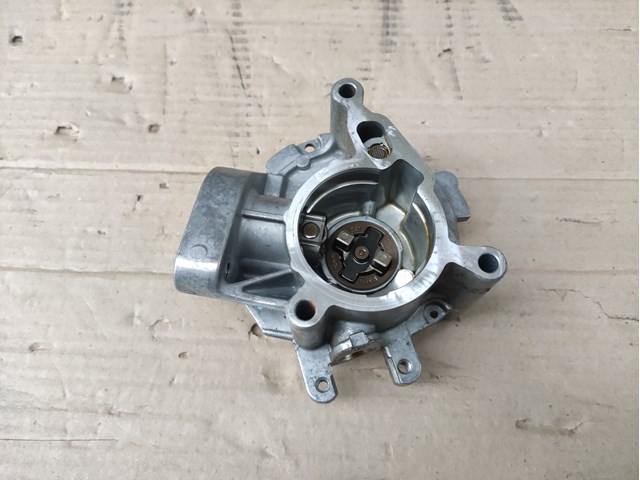 Насос вакуумний 06N145100E VAG