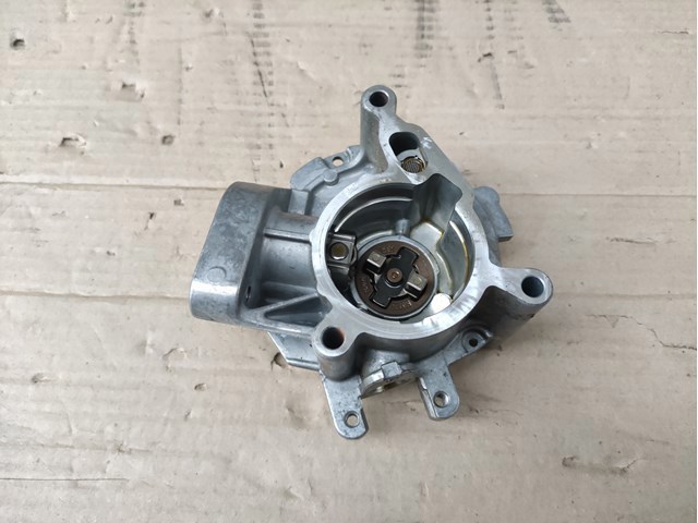 Насос вакуумний 06N145100E VAG