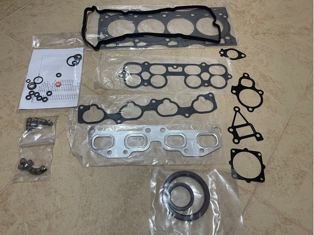 Комплект прокладок двигуна 101018J085 NISSAN