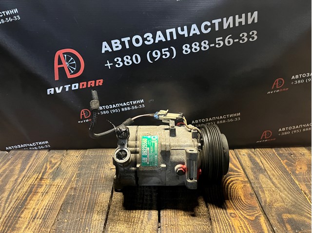 Компресор кліматичної установки 09225560 GM