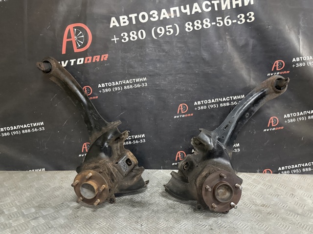 Важіль/тяга задньої підвіски подовжній нижній, лівий 1355136 FORD