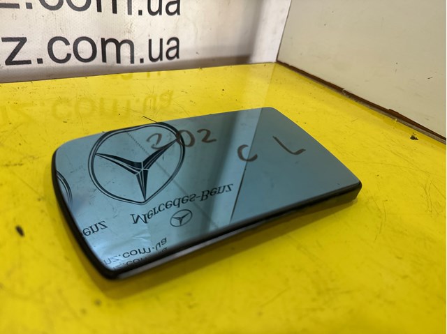 Скло дзеркала заднього виду, лівого 2028100721 MERCEDES