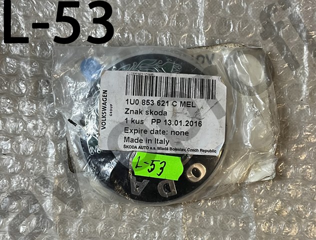 Емблема решітки радіатора 1U0853621CMEL VAG