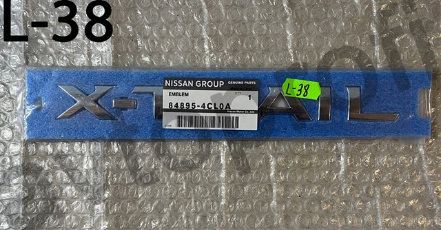 Емблема кришки багажника, фірмовий значок 848954CL0A NISSAN