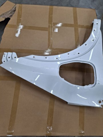 Переднє праве крило F31005MPMA NISSAN