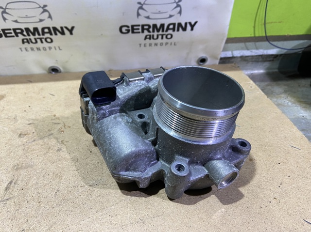 Заслінка повітряна 06K133062AK VAG