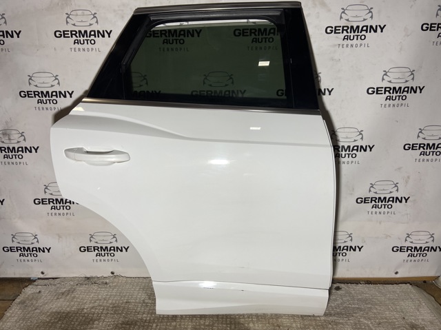 Двері пасажирські задні праві 83A833052C VAG