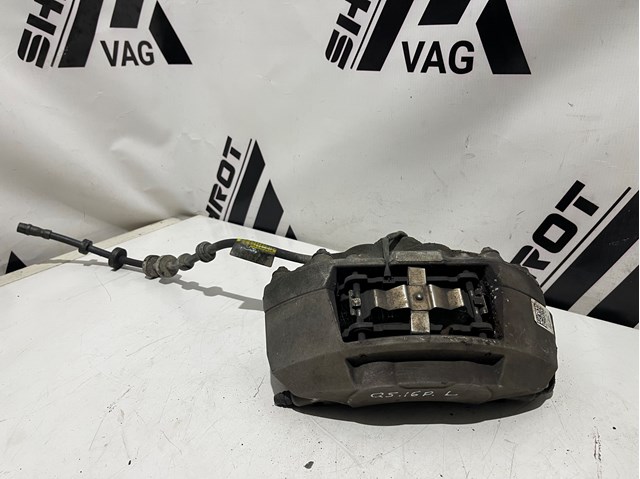 Супорт тормзной 8R0615107F VAG