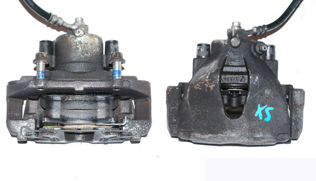 Супорт гальмівний, передній, лівий 93176426 OPEL