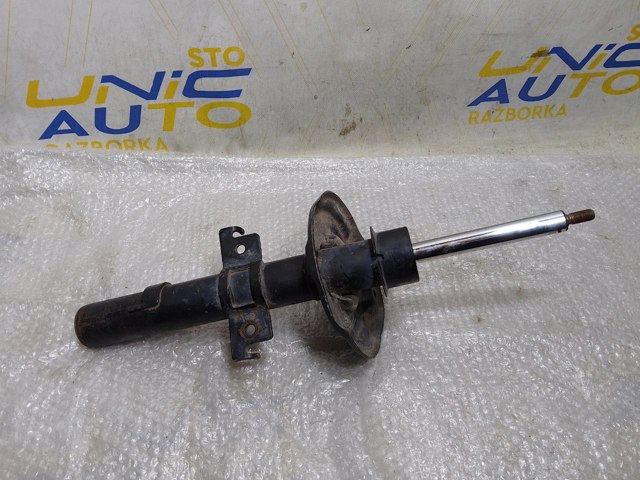 Амортизатор передній 543027894R RENAULT