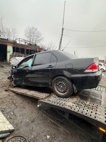 Скло задніх дверей, лівих MR525741 MITSUBISHI