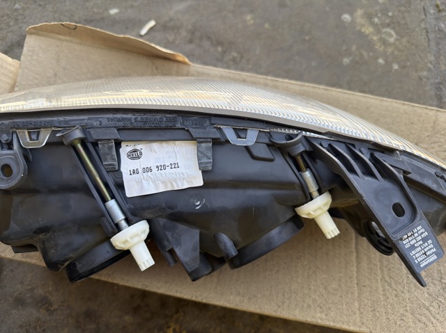 Фара передня права 1AG006920221 HELLA