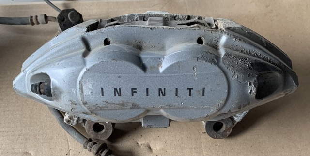 Супорт гальмівний, передній, правий 41001JL02A NISSAN