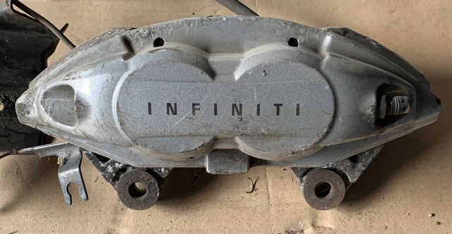 Супорт гальмівний, передній, лівий 41011JL02A NISSAN