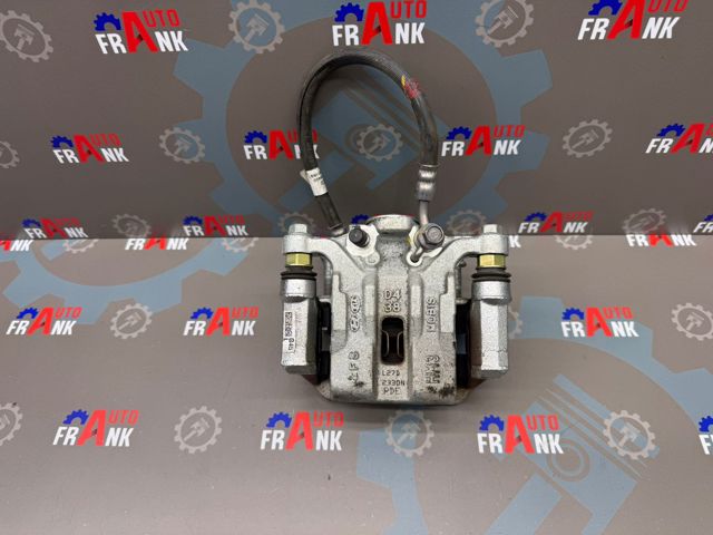 Задній гальмівний супорт лівий 58210G4500 HYUNDAI