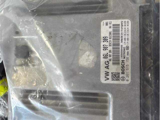 Комп'ютер двигуна 06L907309 VAG