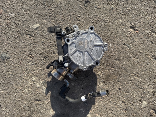 Насос вакуумний 06N145100E VAG