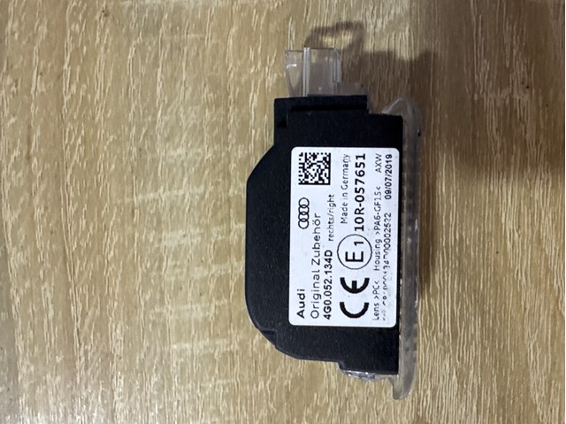 Лампа підсвічування в двері, передньої правої 4G0052134D VAG