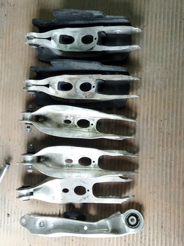 Важелі задньої підвіски 80A505311B VAG