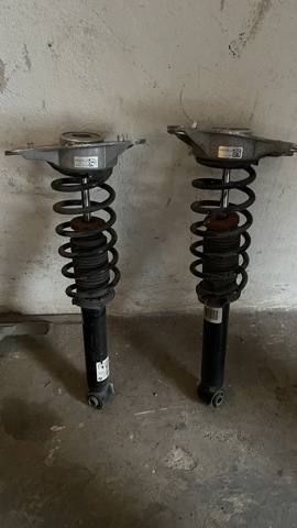 Стійка амортизатора задня 33526852231 BMW
