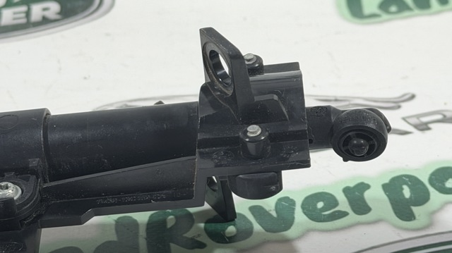 Тримач форсунки омивача фари, підйомний циліндр LR024209 LAND ROVER