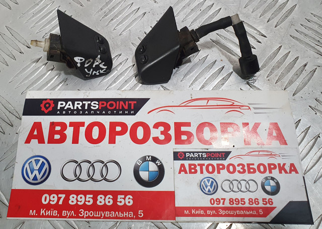 Форсунка омивача фари передньої, лівої 28642EB300 NISSAN