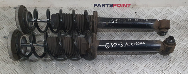 Стійка амортизатора задня 33526866617 BMW