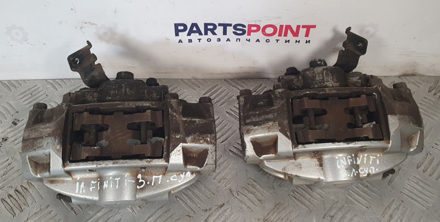 Задній гальмівний супорт лівий 44011JL02A NISSAN