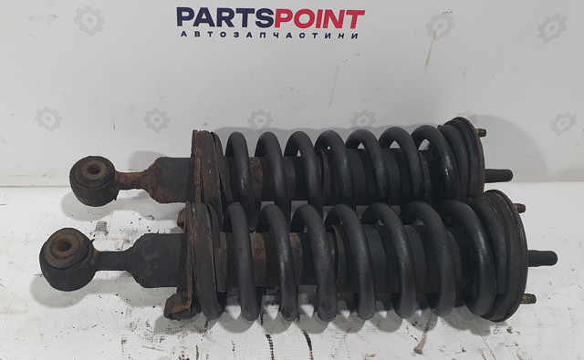 Амортизатори передні 56100EB31E NISSAN