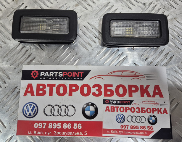 Лампа підсвічування в двері, передньої правої 63316961999 BMW