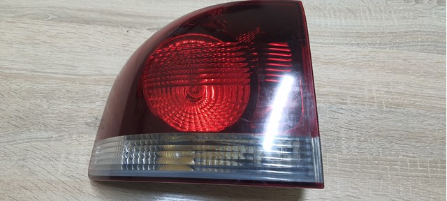 Задній лівий зовнішній ліхтар 7L6945095R VAG