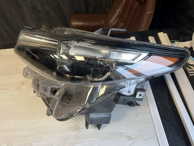Фара ліва TK5051040 MAZDA