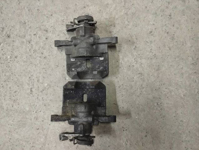 Супорт гальмівний задній правий FR3Z2552G FORD
