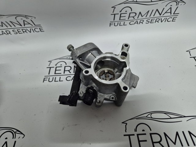 Насос вакуумний 06N145100G VAG