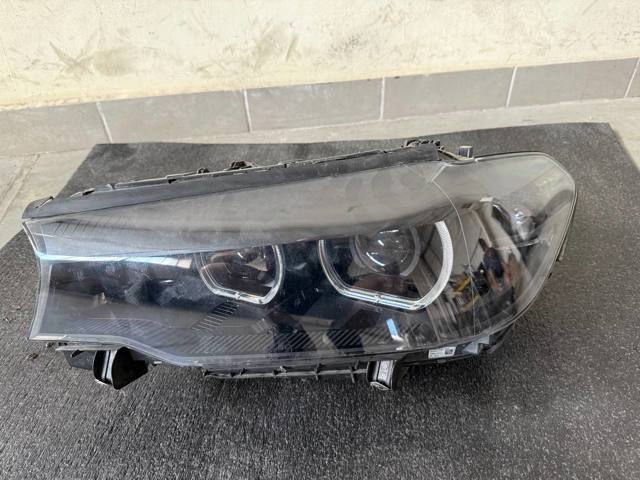Фара ліва 63117214959 BMW