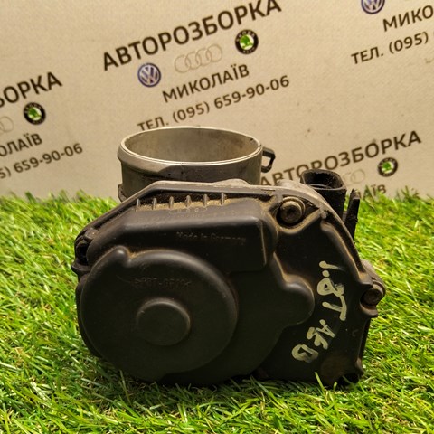 Дросільна заслінка в зборі 058133063M VAG
