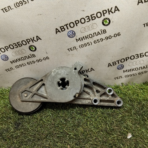 Натягувач приводного ременя 058903133 VAG