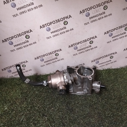 Насос вакуумний 06J145100G VAG
