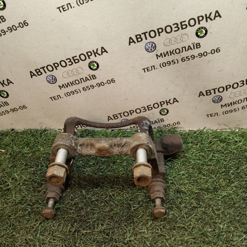 Скоба гальмівного заднього супорта 1K0615426K VAG