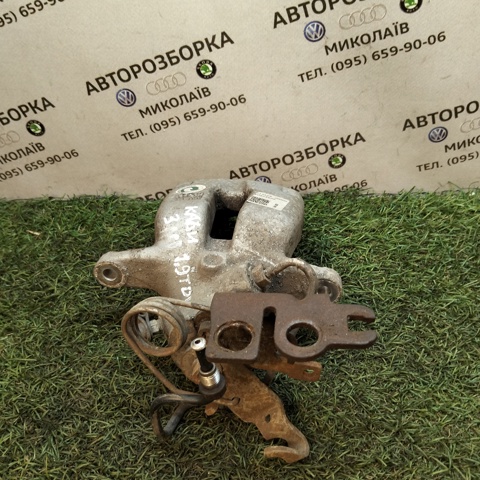 Задній гальмівний супорт лівий 2K0615423B VAG