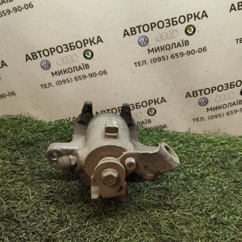 Супорт гальмівний задній правий 6R0615424 VAG
