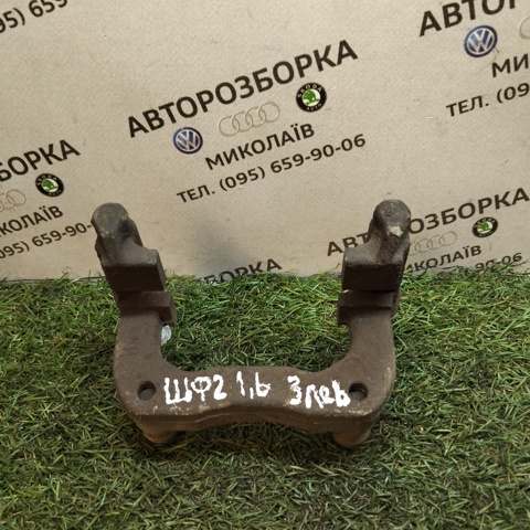 Скоба гальмівного заднього супорта 6R0615425B VAG