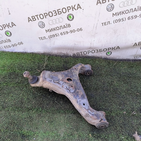 Важіль задньої підвіски нижній, лівий 701501403T VAG