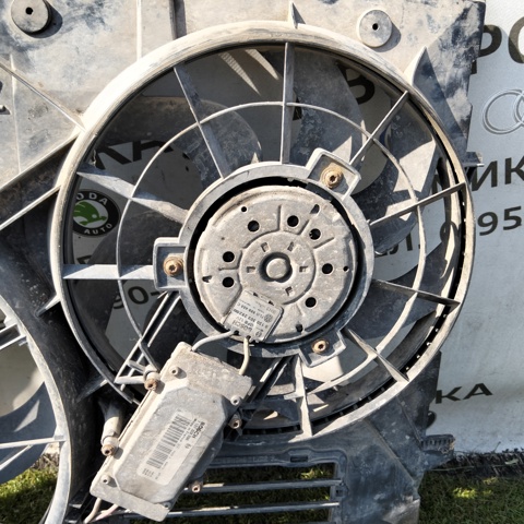 Електровентилятор охолодження в зборі (мотор + крильчатка), лівий 7L0959455C VAG